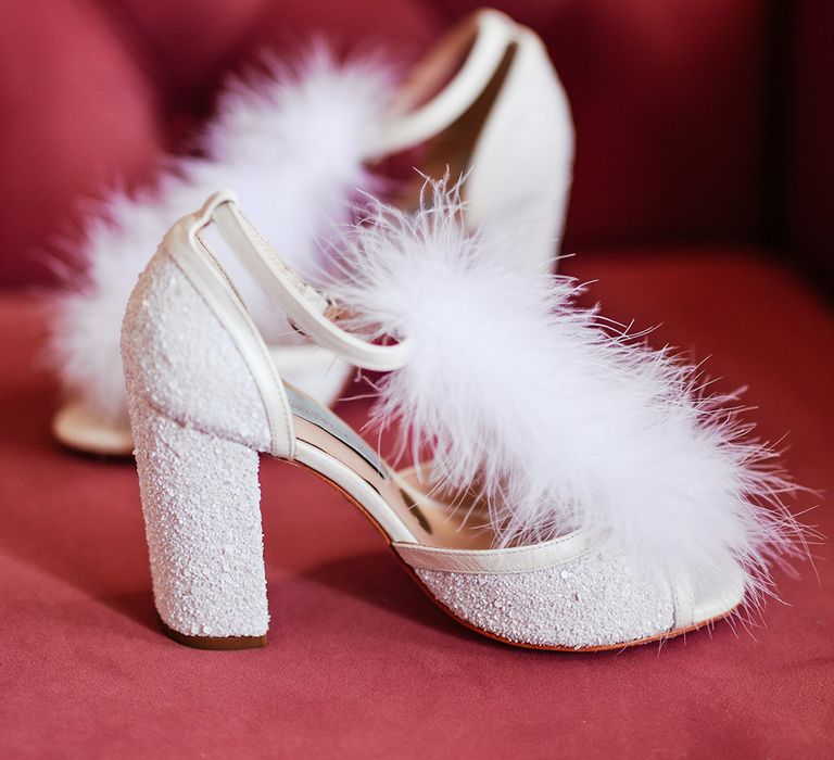 Charlotte Mills glitter block wedding heels with white feathers 