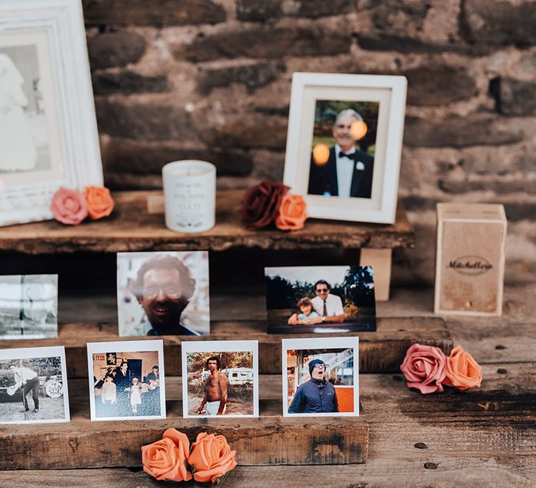 Photo area on a rustic wooden table for lost loved ones