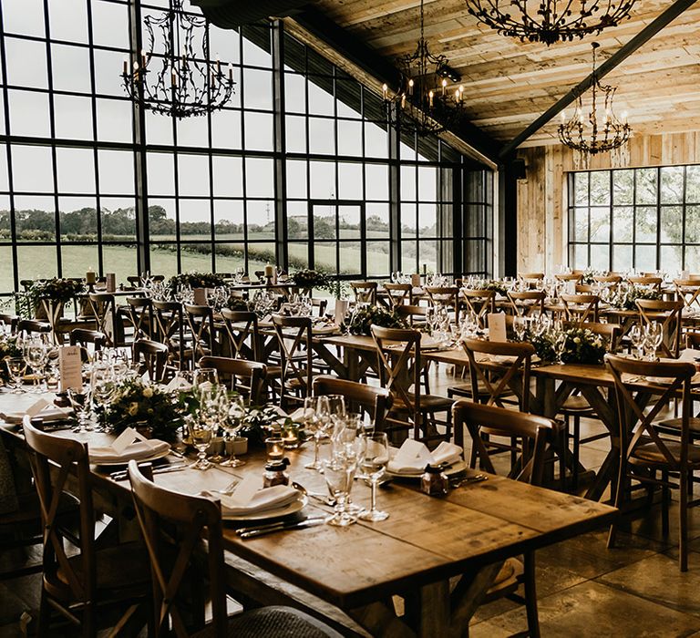 The Botley Hill Barn in Surrey wedding venue decorated in rustic styling for October wedding 