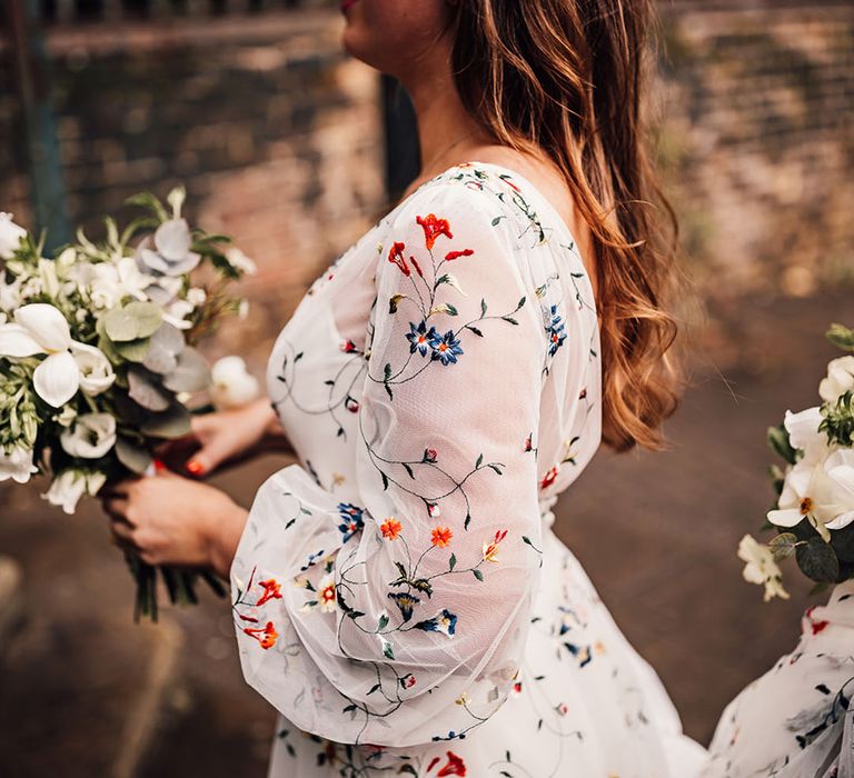 Crypt on The Green wedding with bride wearing embroidered wedding dress 