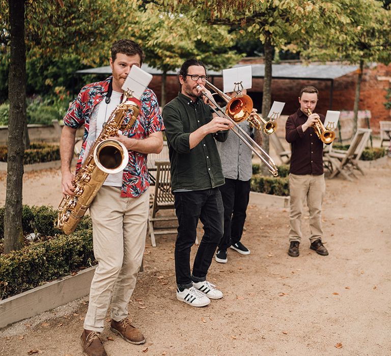 Brass band plays at wedding for entertainment 