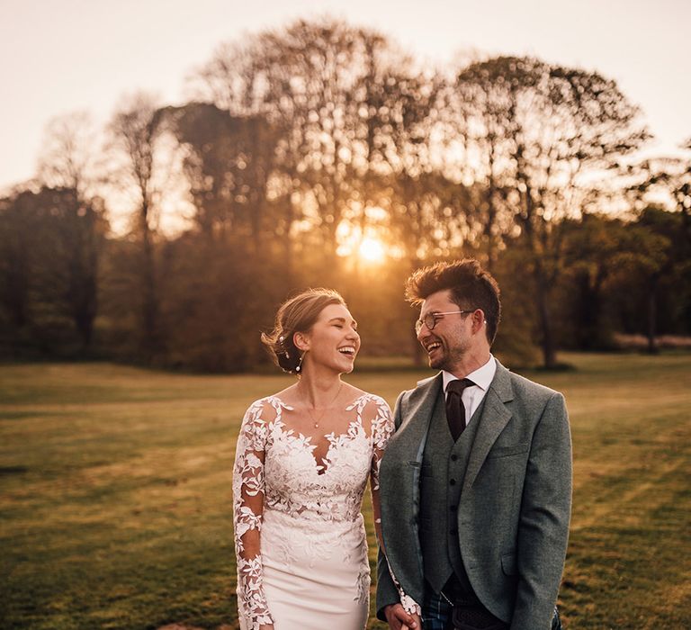 bride-in-illusion-lace-wedding-dress-and-groom-in-kilt