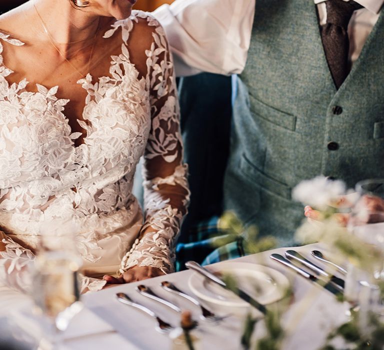 groom-in-green-waistcoat-with-bride-in-illusion-lace-wedding-dress