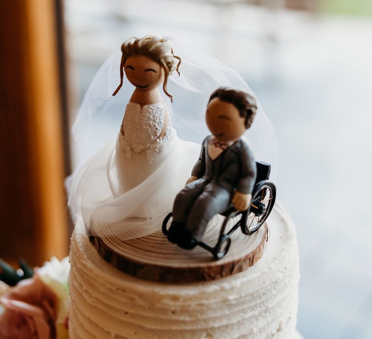 bride-and-groom-cake-toppers-with-groom-in-wheelchair