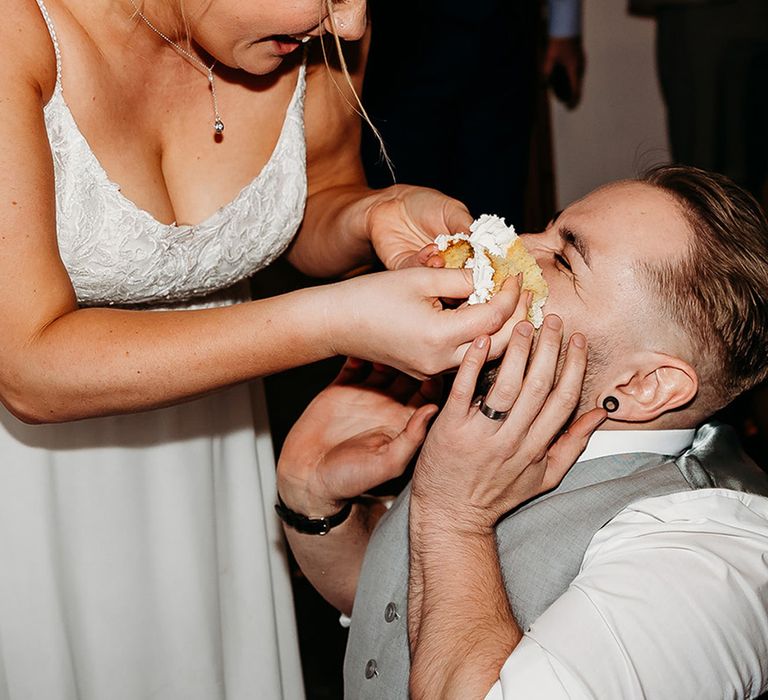 bride-smashes-wedding-cake-into-grooms-face