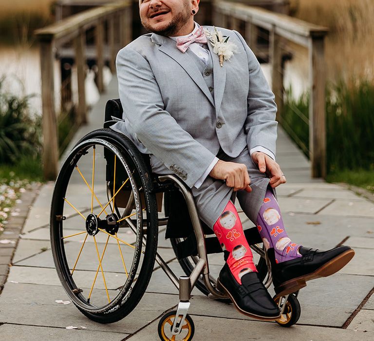 groom-in-light-grey-wedding-suit-with-patterned-socks