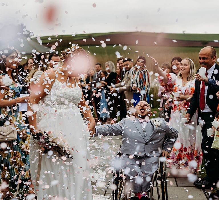 pale-pink-confetti-floats-over-couple