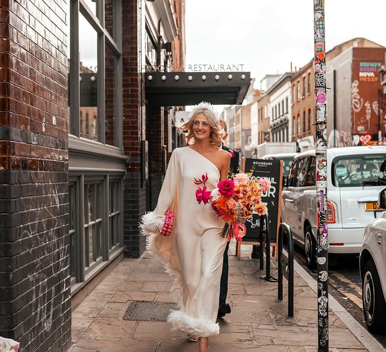 bride-in-cold-shoulder-feather-wedding-dress