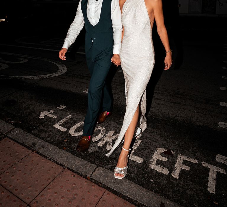 bride-in-sparkly-wedding-reception-dress-with-groom-in-black-tie