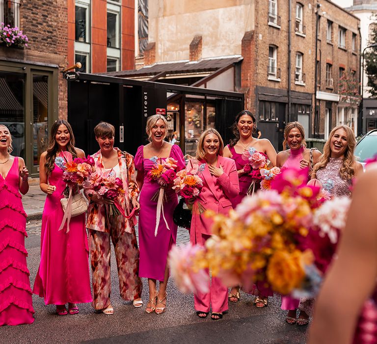 hot-pink-bridesmaid-dresses-and-suits-mismatched-bridal-party