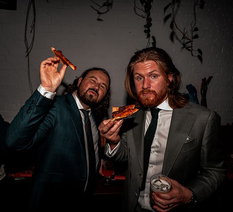 wedding-guests-eating-pizza-slices