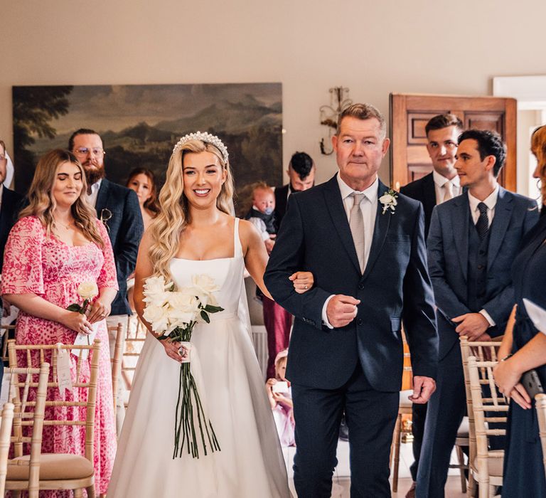 father-of-the-bride-walks-bride-down-the-aisle