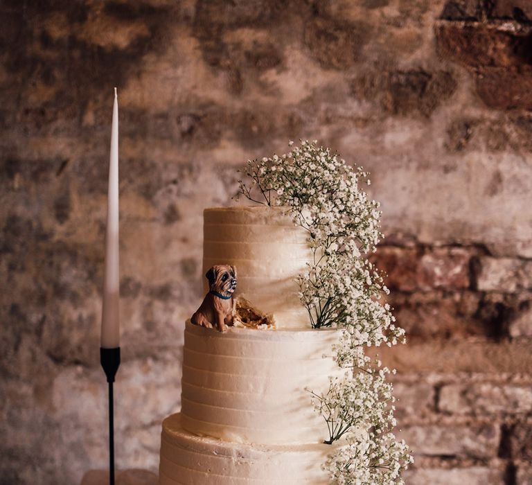 three-tier-wedding-cake-with-gypsophila-and-dog-cake-topper