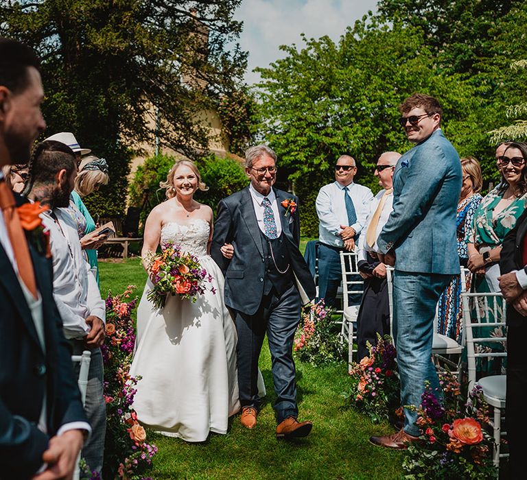 father-of-the-bride-and-bride-walking-down-the-aisle