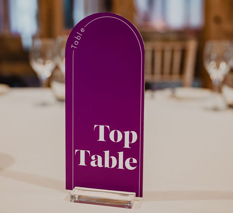 purple-arched-top-table-wedding-sign