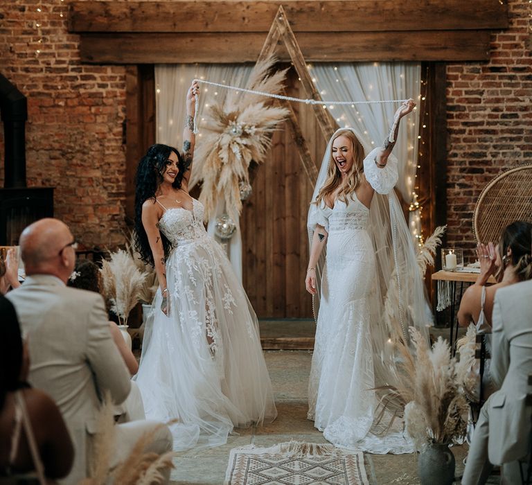 brides-at-boho-wedding-with-handfasting-ceremony