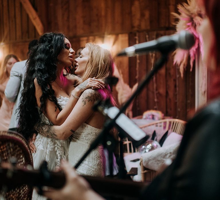 brides-dancing-at-their-wedding-reception