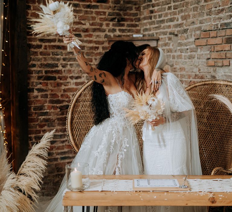 brides-kiss-at-the-signing-of-the-register