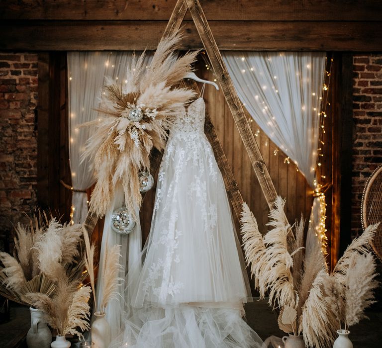 pampas-grass-wedding-altar-decorations-with-disco-balls-and-fairy-lights