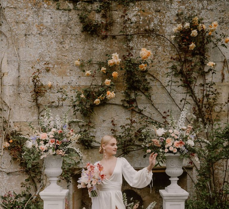 bride-in-puff-sleeve-whimsical-wedding-dress-at-castle-wedding