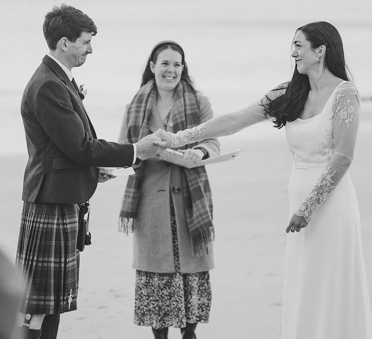 bride-and-groom-exchange-wedding-vows