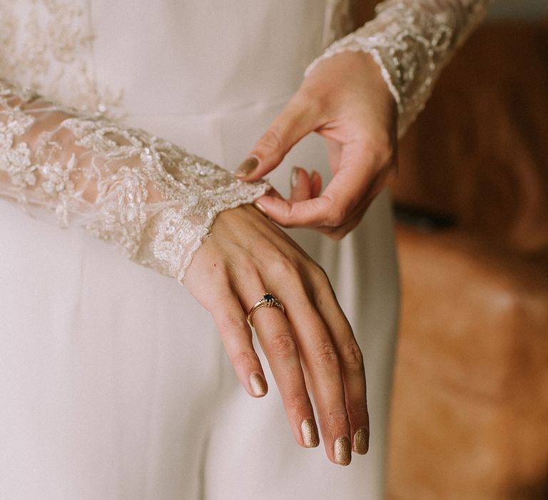 bride-wearing-lace-long-sleeve-wedding-dress