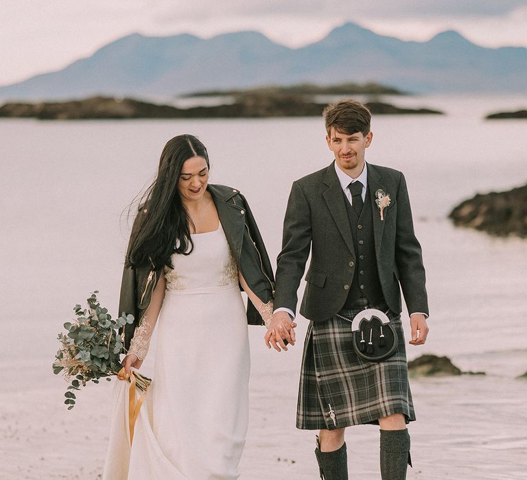 bride-wearing-leather-jacket-with-groom