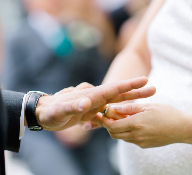 bride-and-groom-exchanging-rings