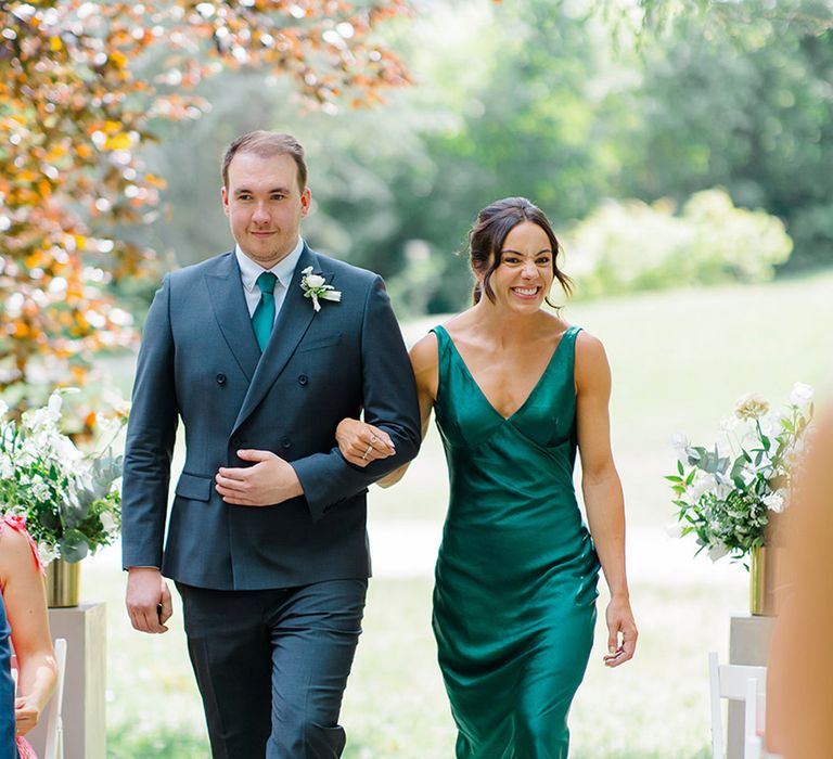 bridesmaid-in-emerald-bridesmaid-dress-with-groomsman-wearing-matching-tie