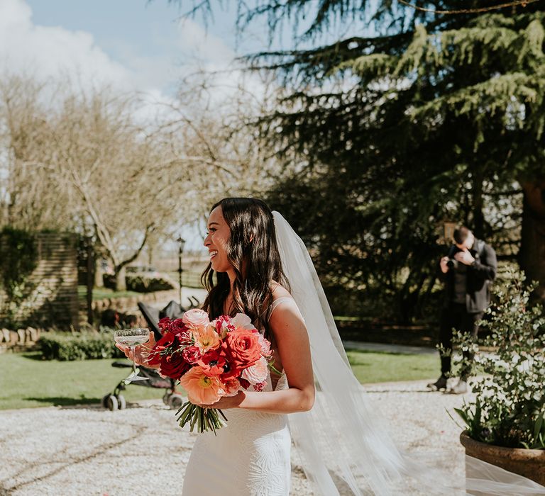 bride-in-flower-embroidered-wedding-dress-with-train