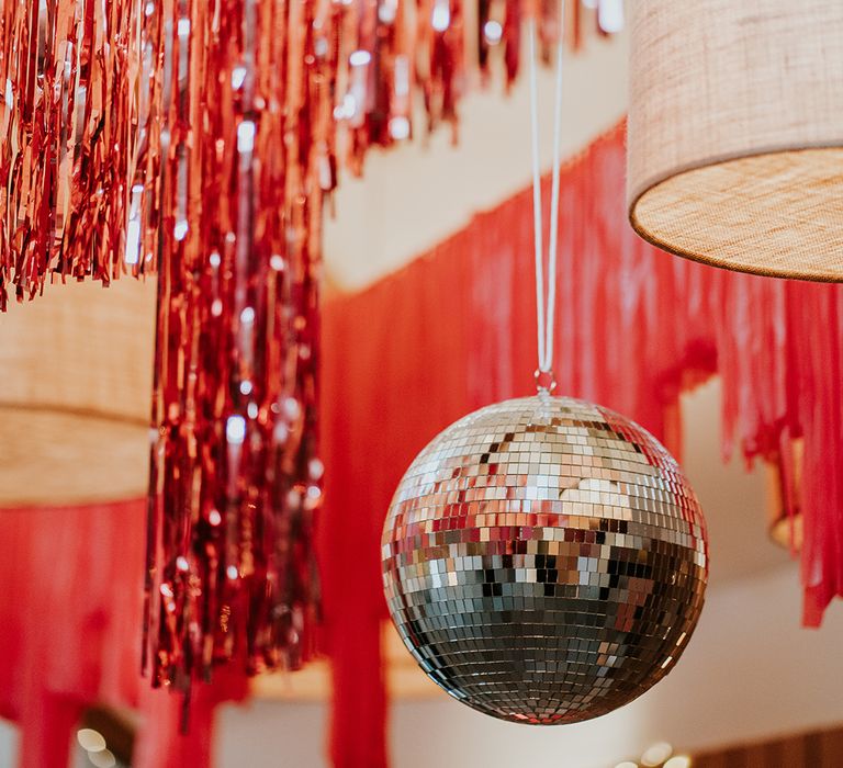 metallic-wedding-streamer-decor-with-disco-balls