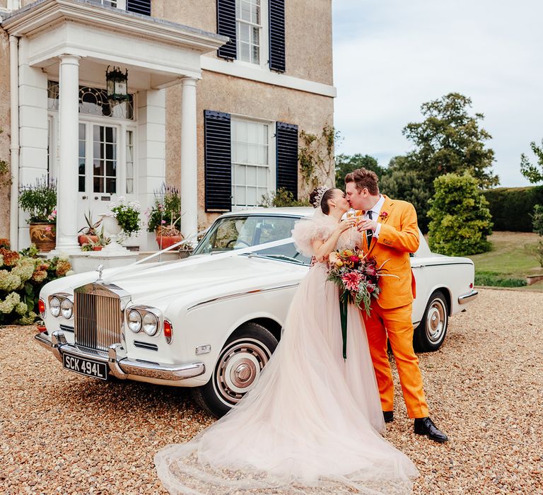 bride-and-groom-kiss-at-luxe-country-house-wedding