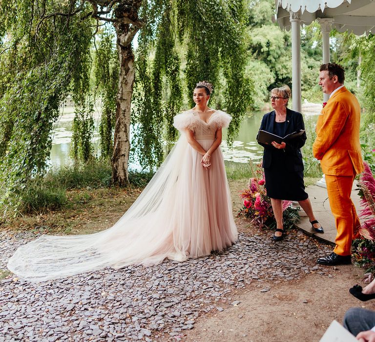 bride-in-pink-wedding-dress-at-preston-court-wedding.