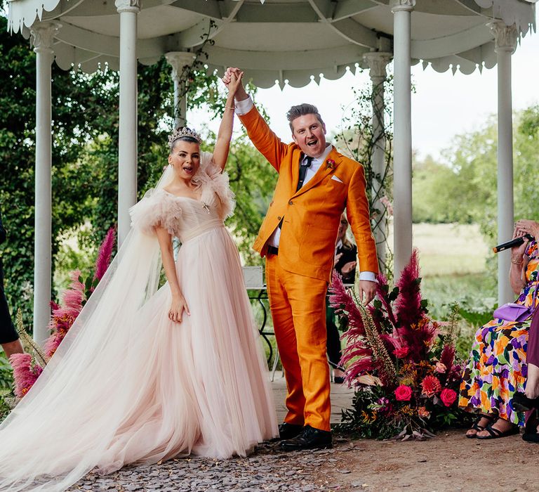 colourful-outdoor-wedding-ceremony-at-preston-court