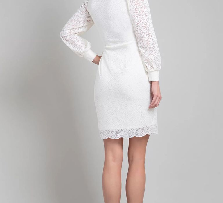 Back view of budget friendly short lace wedding dress with square neckline and full length sleeves from Alie Street