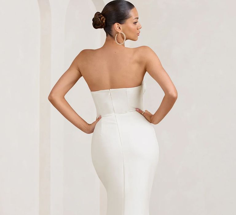 back view of white bandeau fishtail budget friendly maxi wedding dress from Club L London