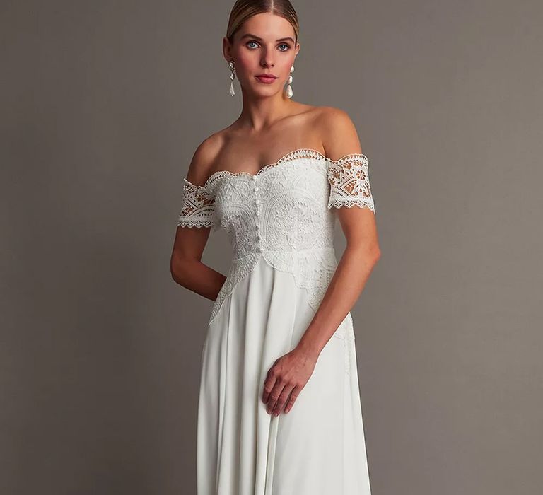 Front view of off-shoulder budget wedding dress with lace bodice from Monsoon