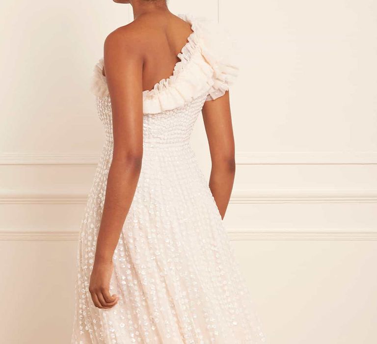 Back view of one-shoulder champagne-coloured budget wedding dress in ankle length with sequins