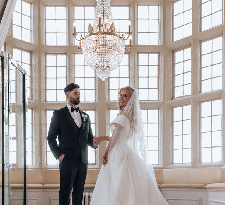 bride-and-groom-at-black-tie-wedding-howsham-hall