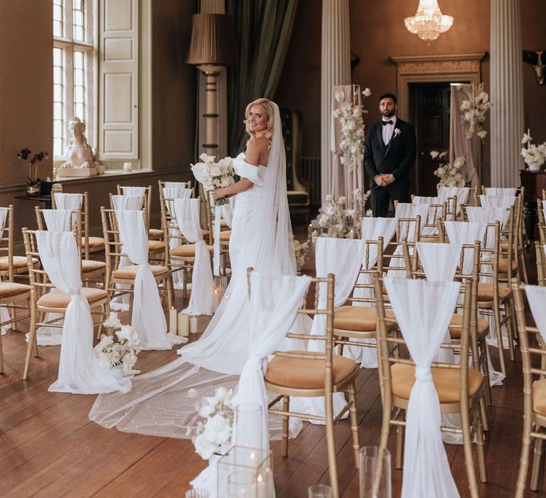 white-wedding-chair-decorations-at-howsham-hall