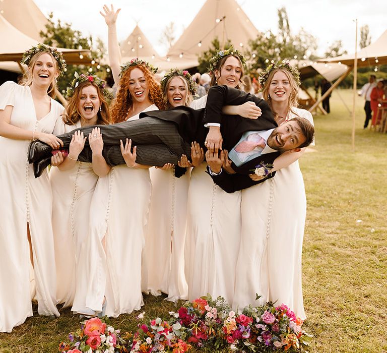 bridal-party-in-ivory-bridesmaid-dresses-with-flower-crowns