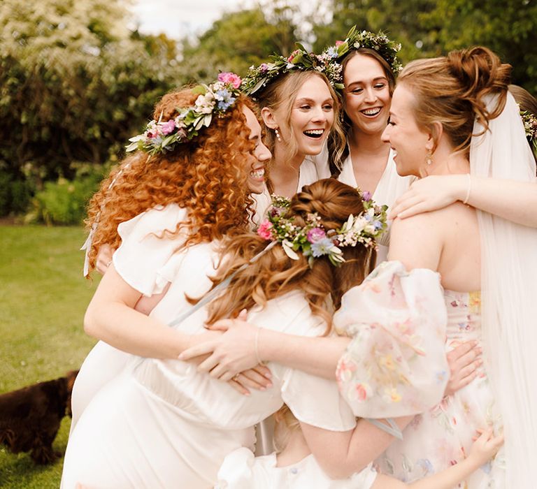 bridesmaids-wearing-ivory-bridesmaid-dresses-with-flower-crowns