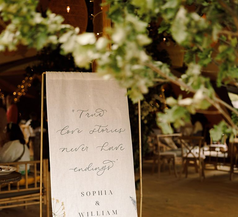 fabric-wedding-signage-with-flowers