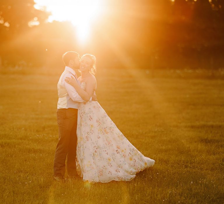 golden-hour-wedding-photo-with-bride-and-groom