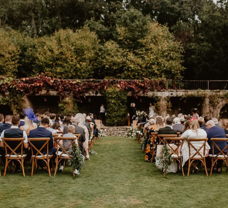 voewood luxury wedding venue outdoor ceremony area with guests seated