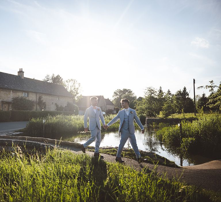 country-estate-wedding-with-grooms-posing-for-couple-portrait