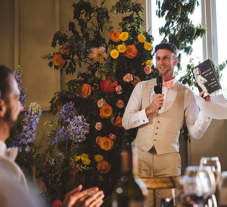 groomsmen-makes-speech-holding-britney-spears-book