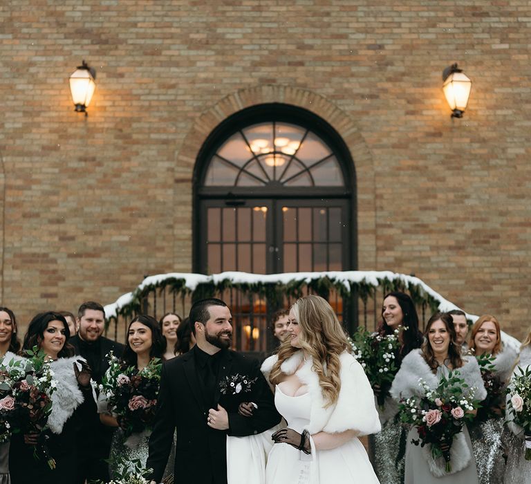 bride-and-groom-at-gothic-wedding-with-large-wedding-party