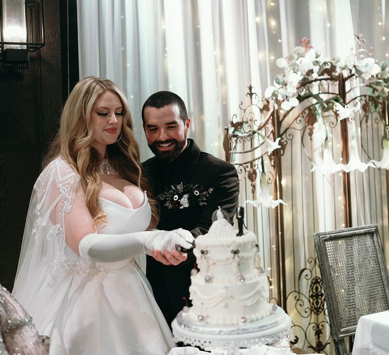 bride-and-groom-cut-wedding-cake