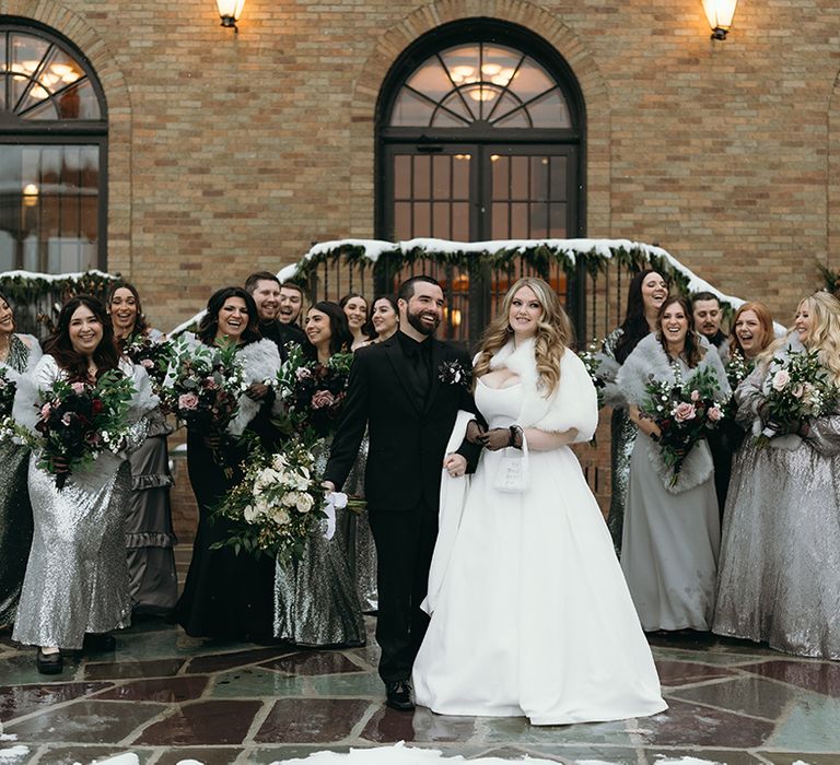 bridesmaids-in-silver-dresses-and-groomsmen-in-black-suits